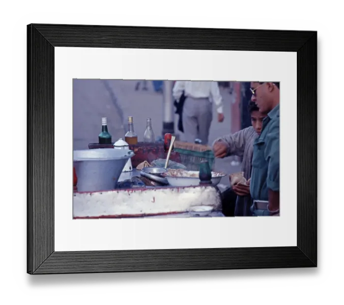 Framed Print : Boy serving at cookshop, customer