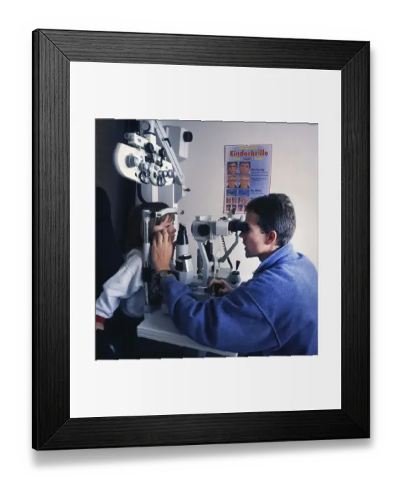 Framed Print : The regular check-up at the ophthalmologist