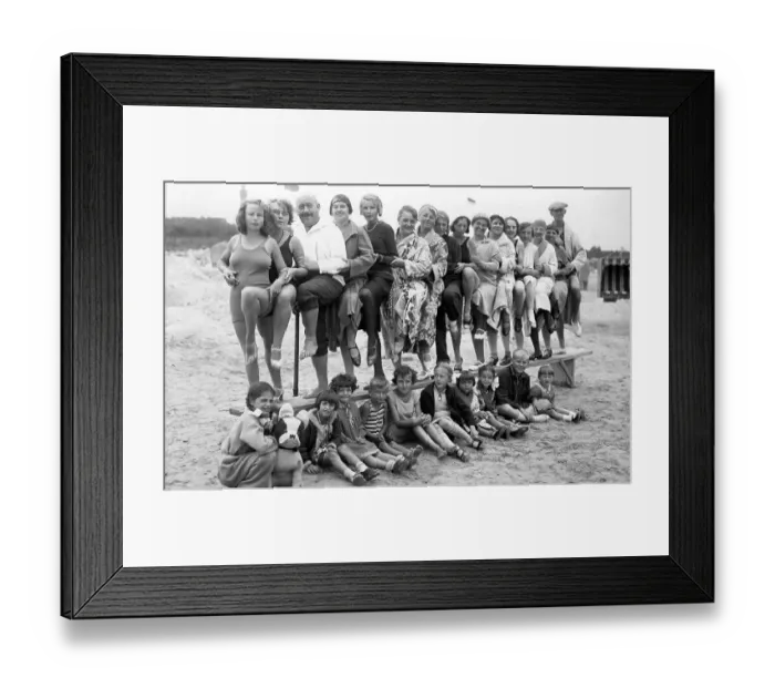 Framed Print : Group with bathers on the beach