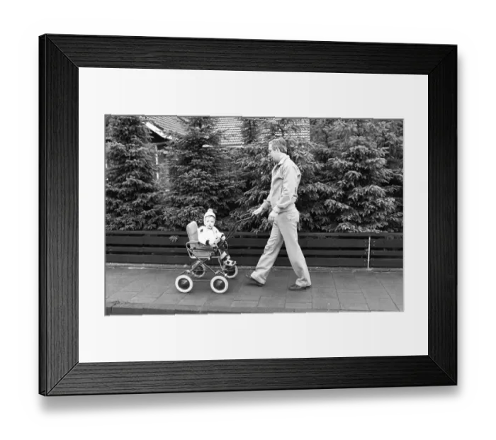 Framed Print : The care of a small child by the father was rather rare in 1980
