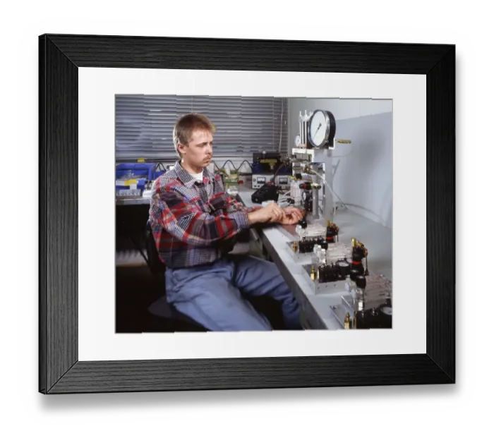 Framed Print : Workmen building a coal-fired power plant