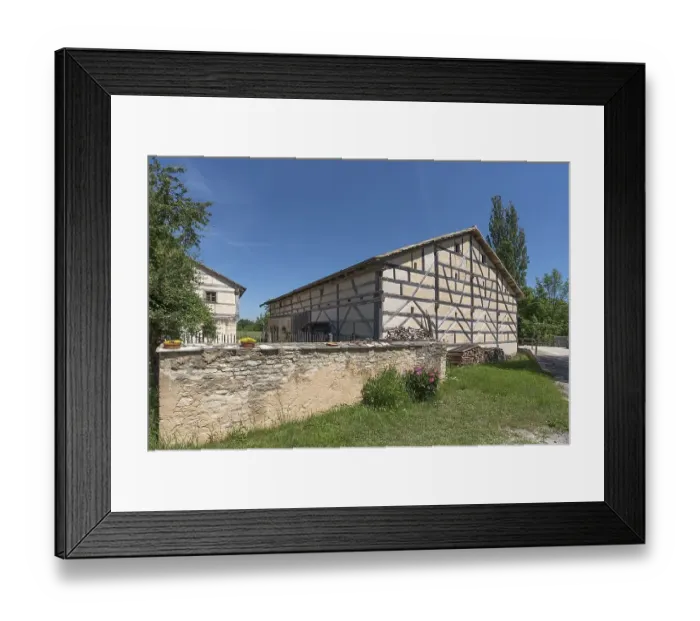 Framed Print : Historic barn of an outlet mill