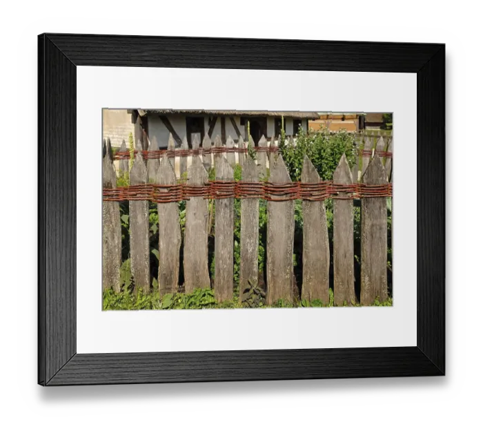 Framed Print : Old wooden fence connected with willow rods