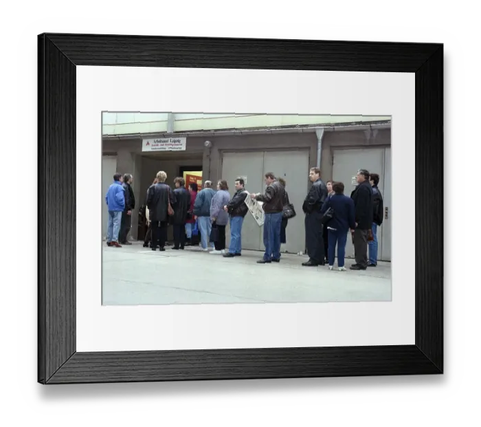 Framed Print : Unemployed people in a queue at the Leipzig job centre