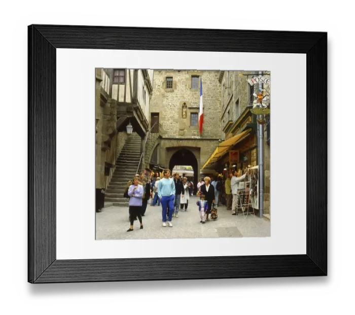 Framed Print : Street folk life in Mont Saint Michel