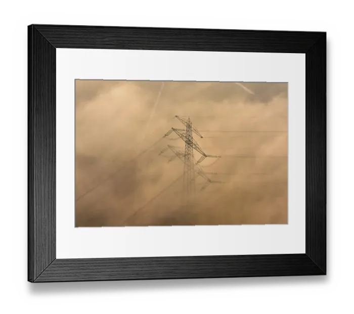 Framed Print : Aerial view of a high-voltage pylon in the fog