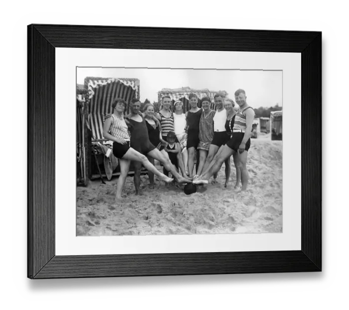 Framed Print : Group with bathers at the beach