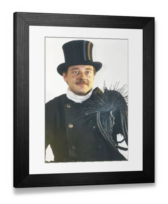 Framed Print : Chimney sweep in professional training and posing in a photo studio
