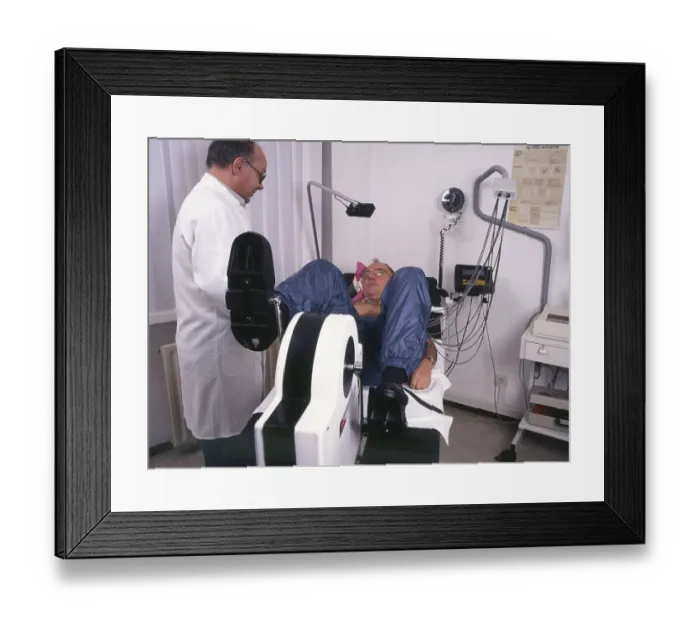 Framed Print : A stress ECG is performed on a patient in a cardiology practice in Iserlohn