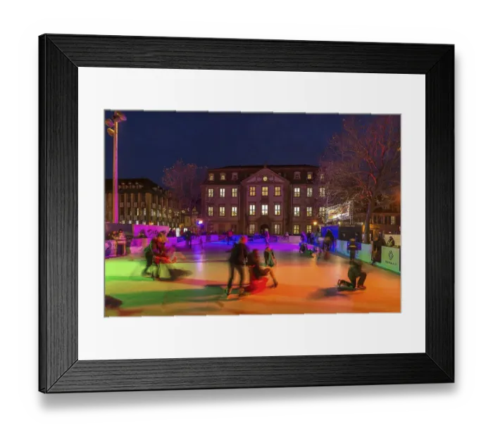 Framed Print : Ice skating rink in colourful evening lighting