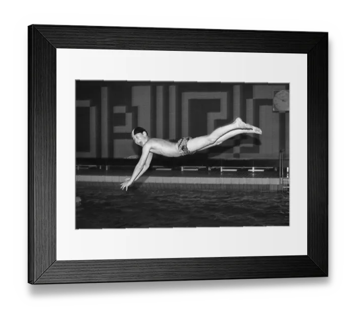 Framed Print : Boy jumps from three-metre board