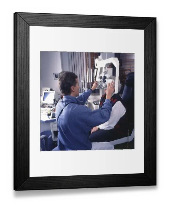 Framed Print : The regular check-up at the ophthalmologist