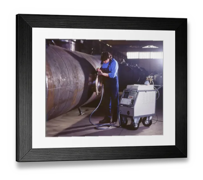 Framed Print : Workmen building a coal-fired power plant