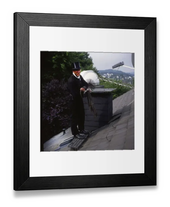 Framed Print : Chimney sweep in professional training and posing in a photo studio Framed Print : Chimney sweep in professional training and posing in a photo studio