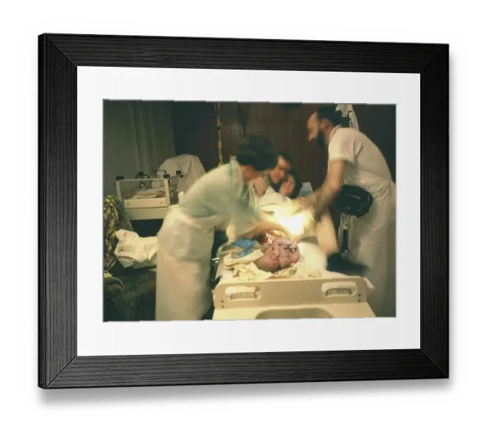 Framed Print : The birth of a child in hospital