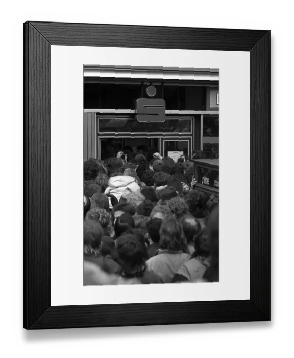 Framed Print : Fall of the Berlin Wall, people standing in line for the 100 DM Begruessungsgeld