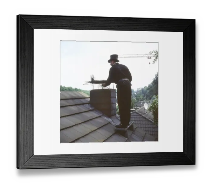 Framed Print : Chimney sweep in professional training and posing in a photo studio Framed Print : Chimney sweep in professional training and posing in a photo studio