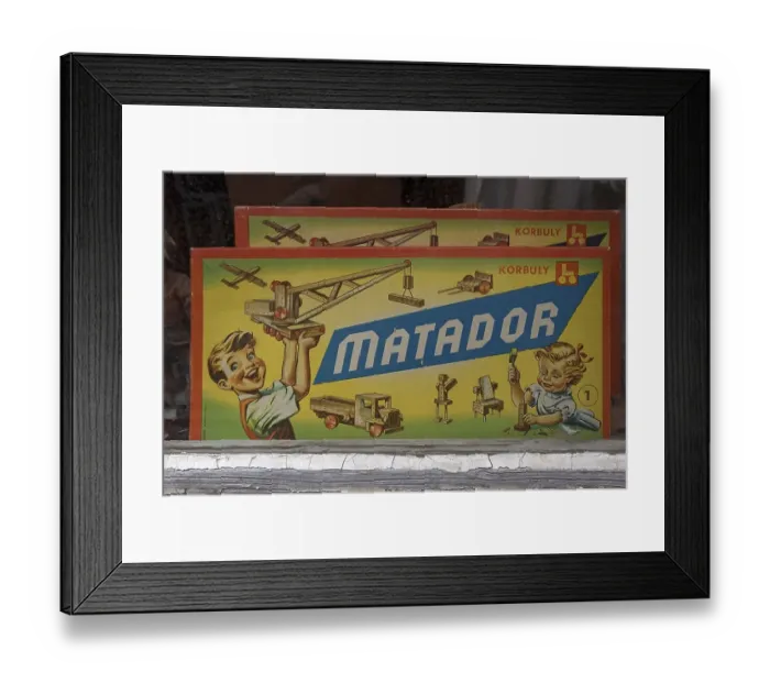 Framed Print : Old Matador construction set packaging from the 1950s in a shop window