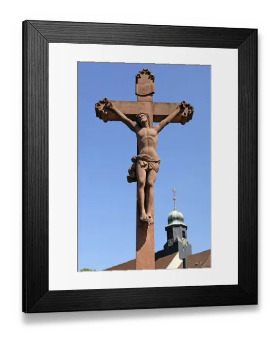 Framed Print : Christ Cross against blue sky at the back of St Framed Print : Christ Cross against blue sky at the back of St