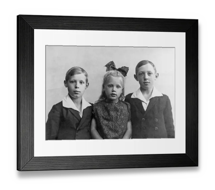 Framed Print : Portrait, three siblings looking into the camera