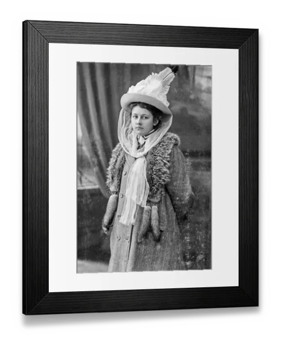 Framed Print : Portrait, young woman with hat looking into the camera