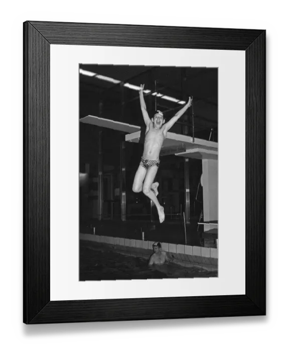 Framed Print : Boy jumping from the three-metre board