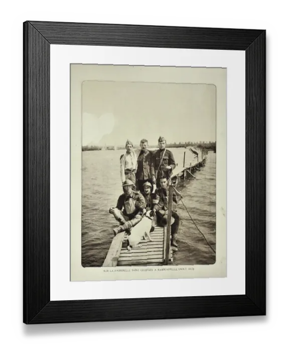 Framed Print : Soldiers with dog on boardwalk in flooded terrain at Ramskapelle in Flanders during the First World War