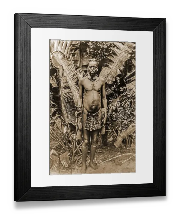 Framed Print : Portrait of an African man in front of banana trees