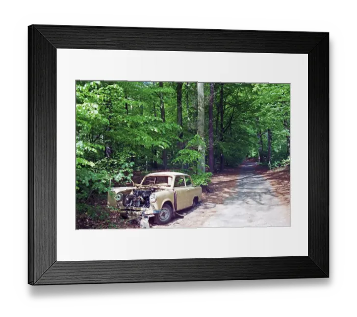 Framed Print : Scrap Trabi parked in the forest near Binz