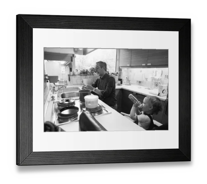 Framed Print : The care of a small child by the father was rather rare in 1980 Framed Print : The care of a small child by the father was rather rare in 1980