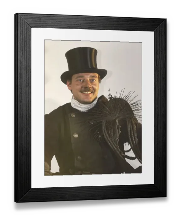 Framed Print : Chimney sweep in professional training and posing in a photo studio Framed Print : Chimney sweep in professional training and posing in a photo studio