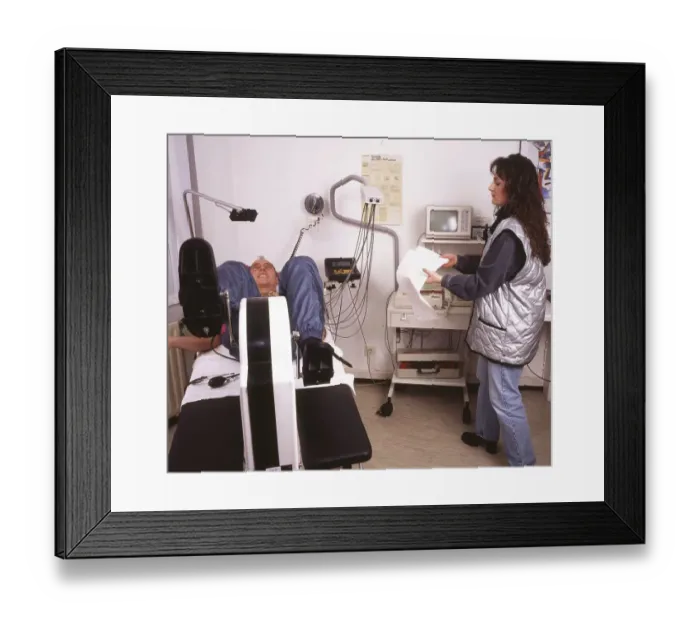 Framed Print : A stress ECG is performed on a patient in a cardiology practice in Iserlohn