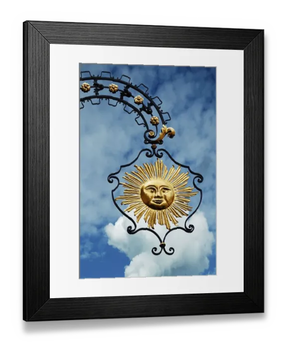 Framed Print : Nose sign of the Hotel Gasthof Sonne against cloudy sky