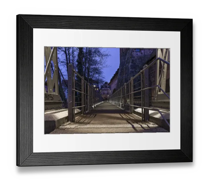 Framed Print : Chain footbridge in evening illumination Framed Print : Chain footbridge in evening illumination