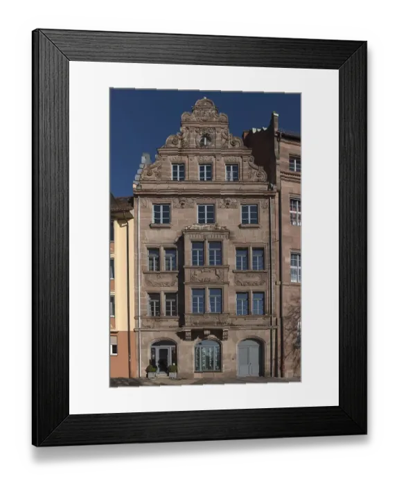 Framed Print : Historic, heritage-protected residential and commercial building with double-storey bay window