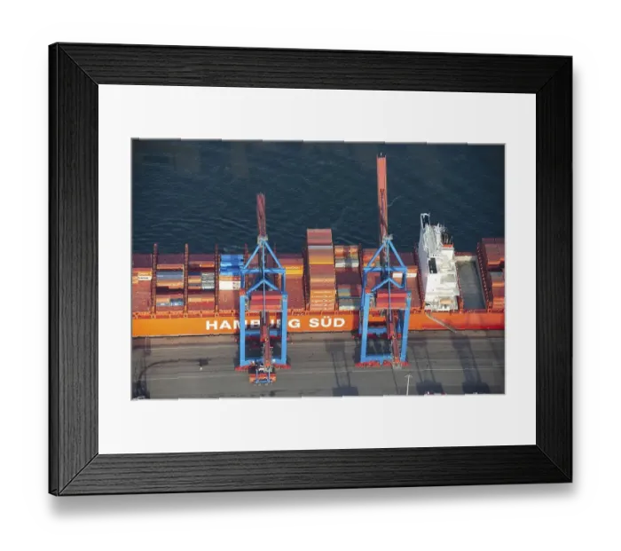 Framed Print : Aerial view of the container ship of the shipping company Hamburg Sued the Santa Teresa at the terminal Burchardkai Framed Print : Aerial view of the container ship of the shipping company Hamburg Sued the Santa Teresa at the terminal Burchardkai