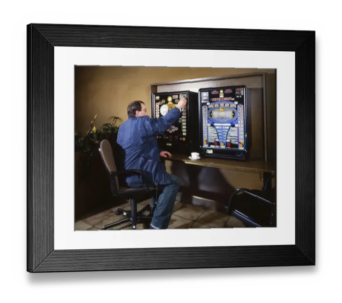Framed Print : Gambling in an arcade, here on 20