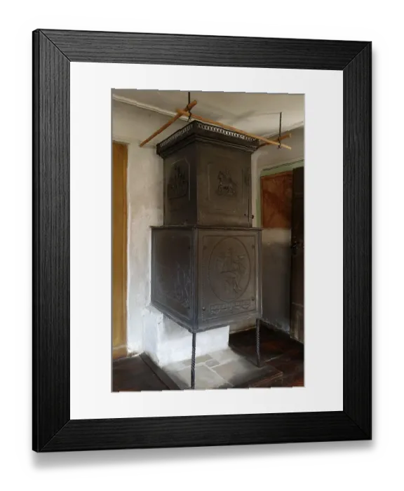 Framed Print : Cast-iron stove from around 1830 in the parlour of the Haeckerhaus