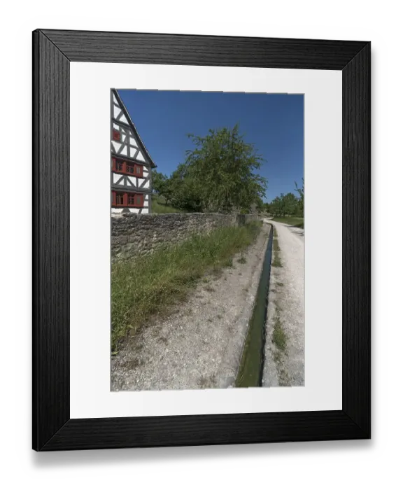 Framed Print : Formerly common water gutters along the roadside Framed Print : Formerly common water gutters along the roadside