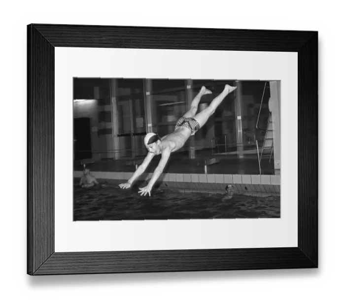 Framed Print : Boy jumps from three-metre board