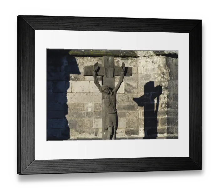 Framed Print : Stone cross with shadow cast, cathedral cemetery near Cologne Cathedral