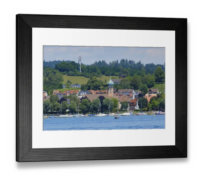 Framed Print : View of the village with St. Nicholas Church