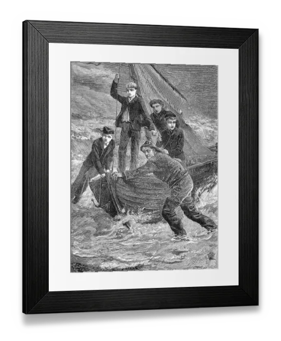 Framed Print : Men bringing a boat to the beach