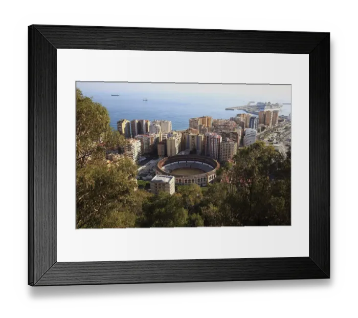 Framed Print : Malaga, view from Castillo de Gibralfaro to a part of the city with the bullring Framed Print : Malaga, view from Castillo de Gibralfaro to a part of the city with the bullring