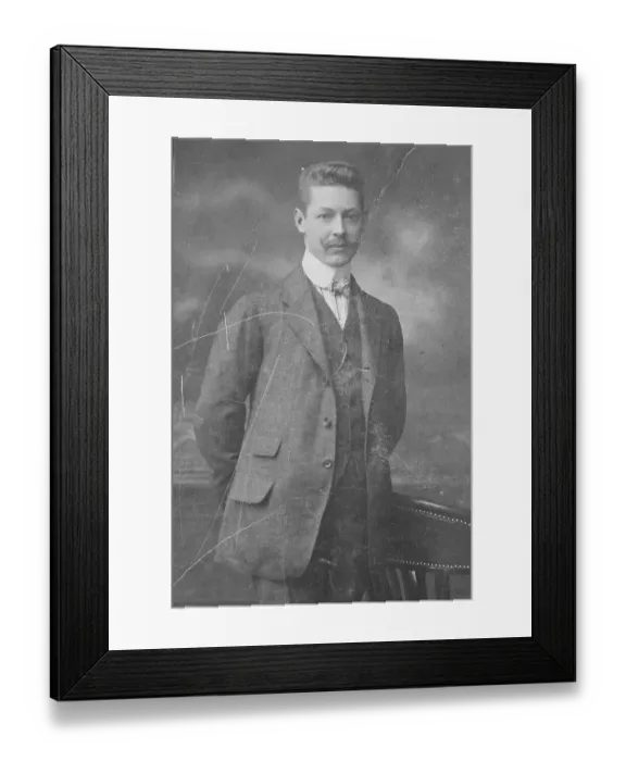 Framed Print : Elegant man in a photo studio, with suit and waistcoat Framed Print : Elegant man in a photo studio, with suit and waistcoat