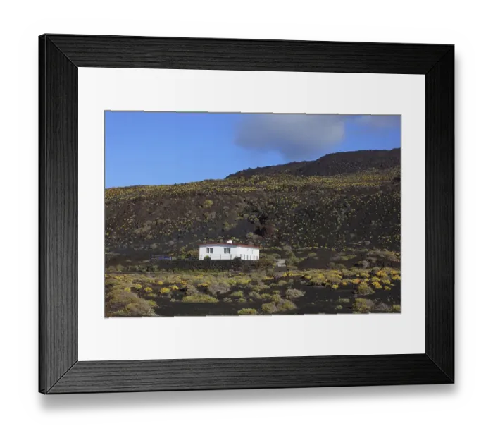 Framed Print : House in the blue volcanic landscape at Punta de Fuencaliente