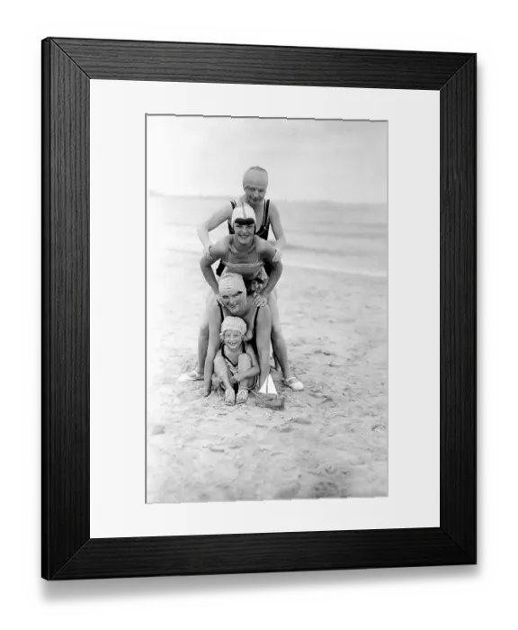 Framed Print : Group with bathers at the beach