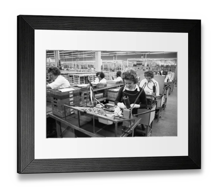 Framed Print : The production of electronic devices by female workers at the Siemens company on 23