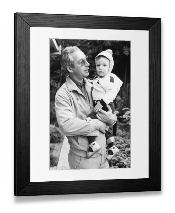 Framed Print : The care of a small child by the father was rather rare in 1980