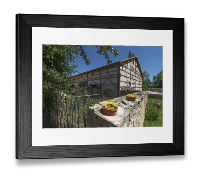 Framed Print : Historic barn of an outlet mill